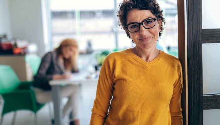 Female broker in office
